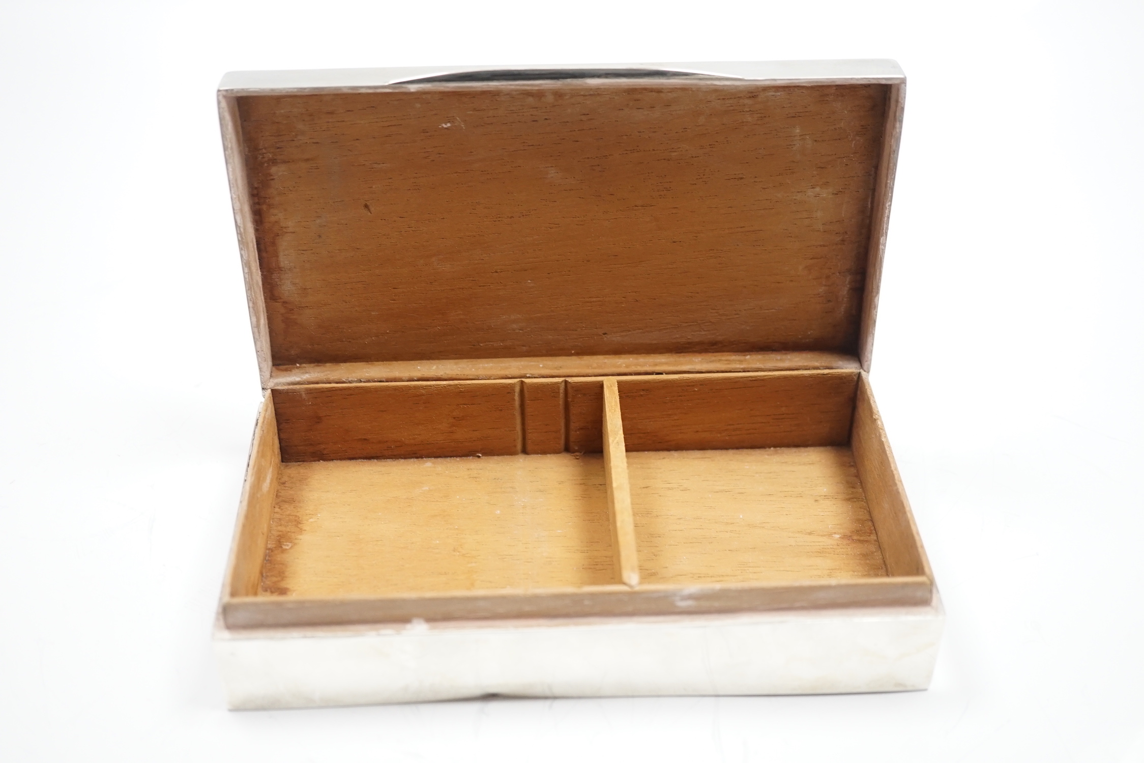 A George V silver mounted rectangular cigarette box, Birmingham, 1918, 17.2cm.